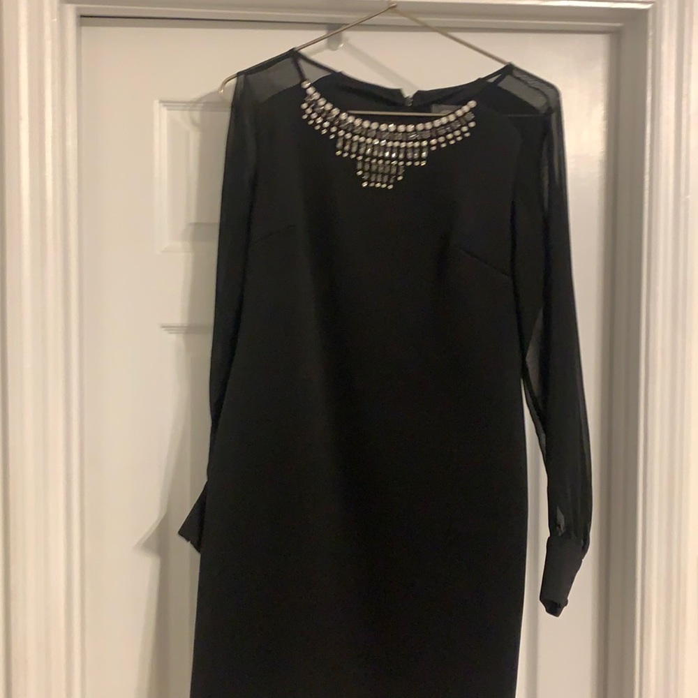 Black dress with sheer sleeves and jewel neck